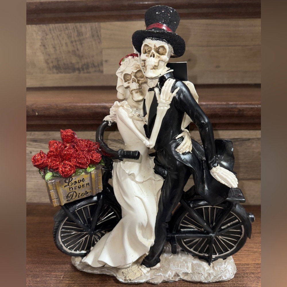 Love Never Dies Skeleton Bridal Couple On Bicycle With Basket of Roses Figurine